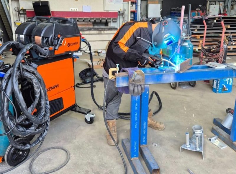 A man showing doing a welding project